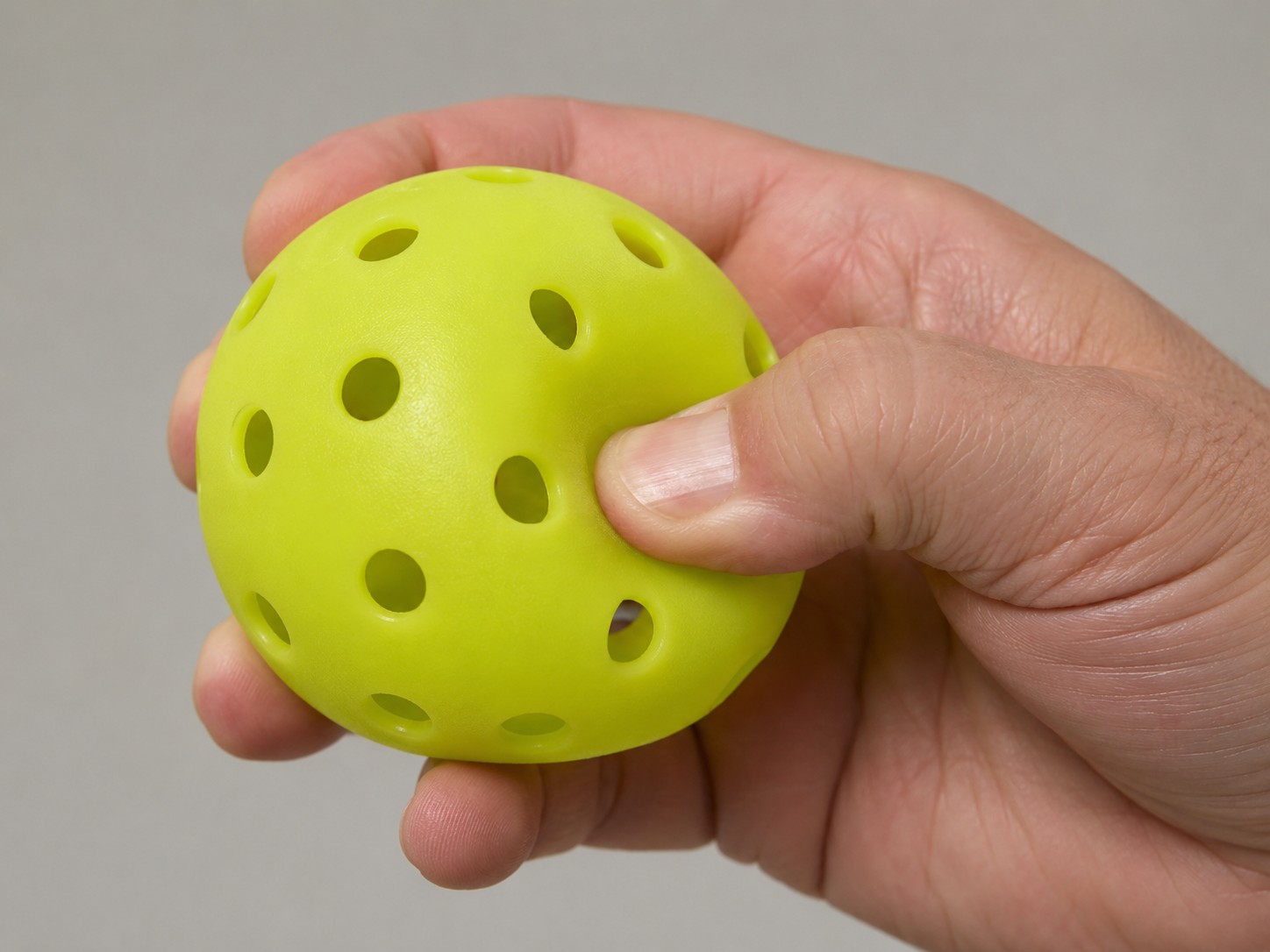 Testing a pickleball for soft spots caused by material fatigue