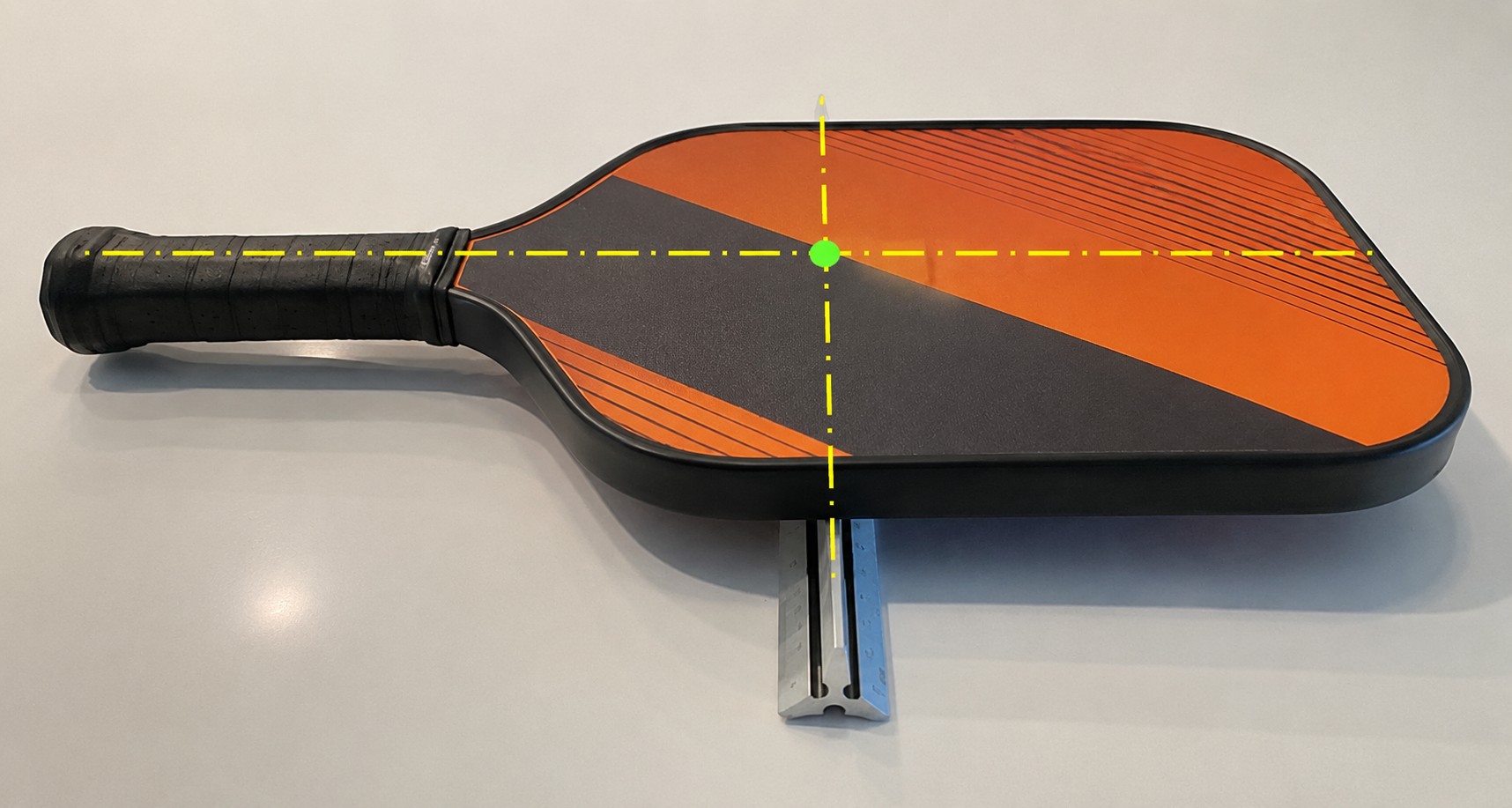 Measuring the balance point of a pickleball paddle